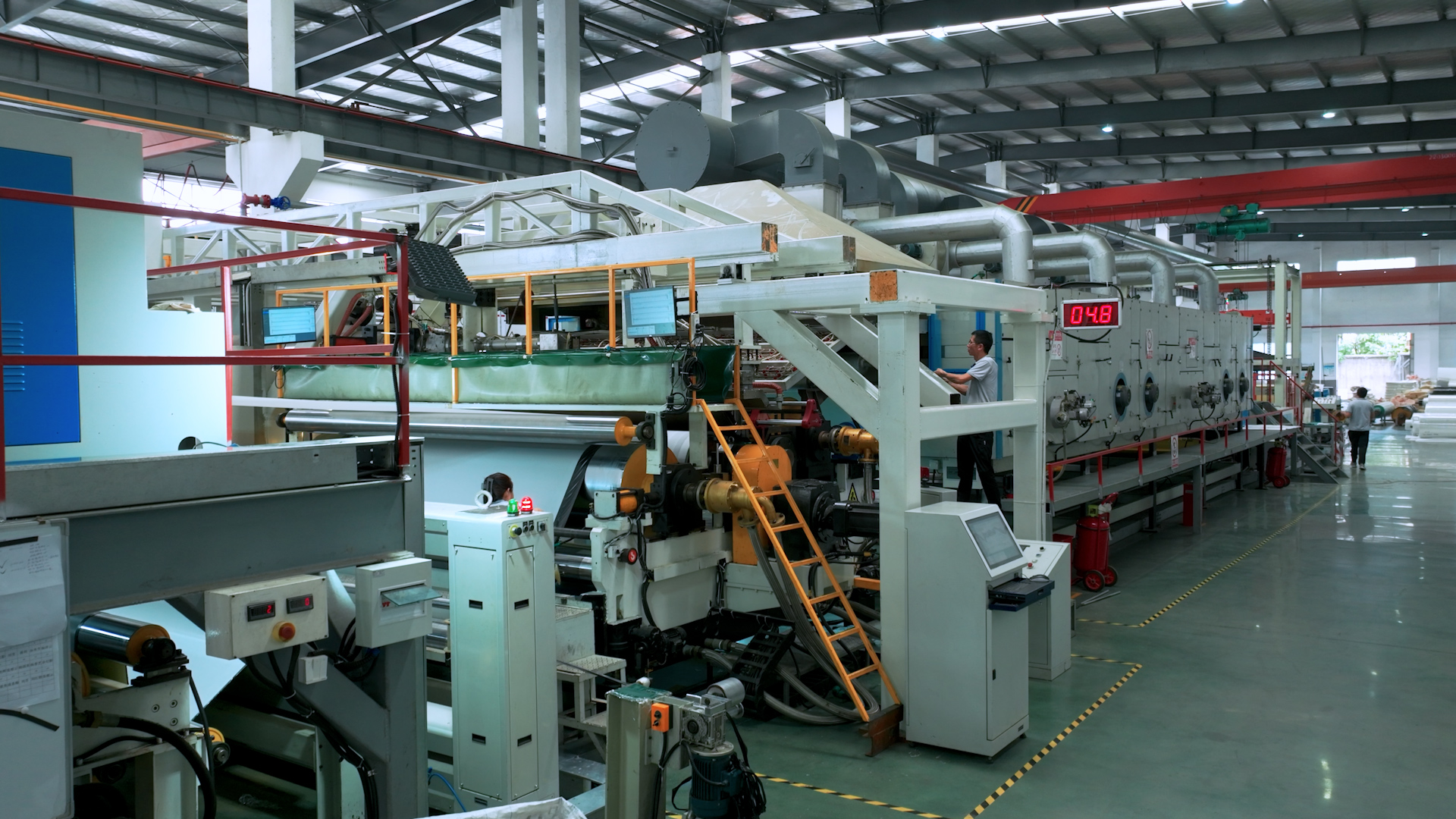 Coating line finishing a full-width belt roll
