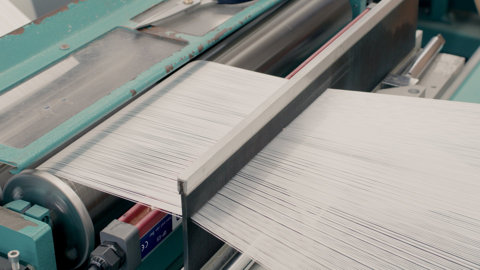 Creel racks feeding warp yarns in the BOSHUN fabric mill