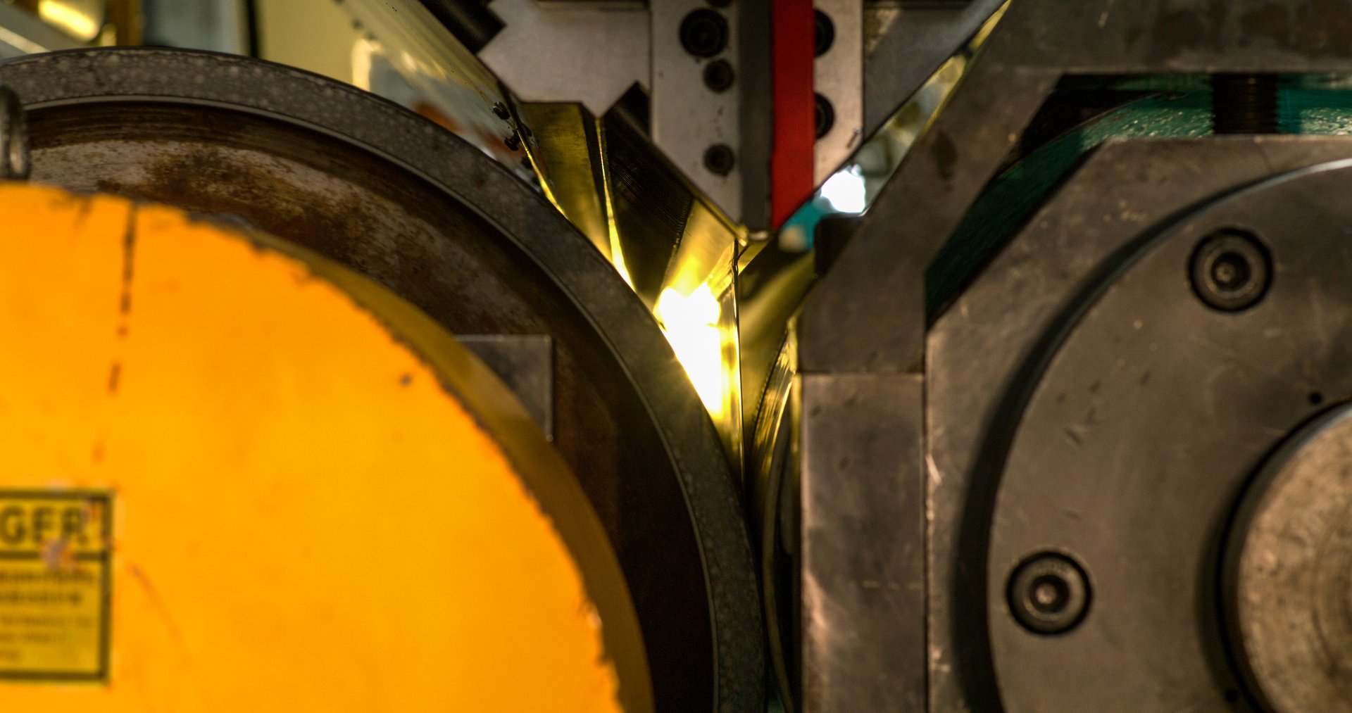 Thermoplastic cover laminated between precision calender rolls